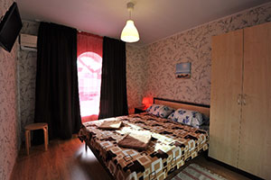 Отдых на Азовском море — 4-х местный номер с двумя раздельными комнатами-Спальня фото